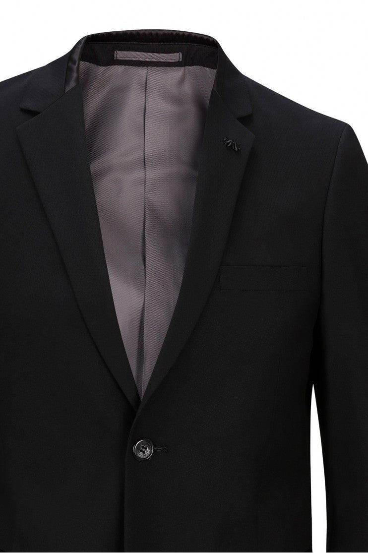 Traje