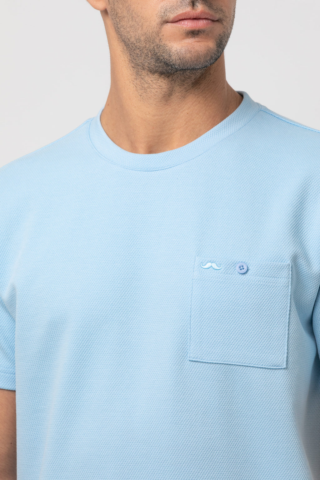 Camiseta bolsillo s/ sombrero