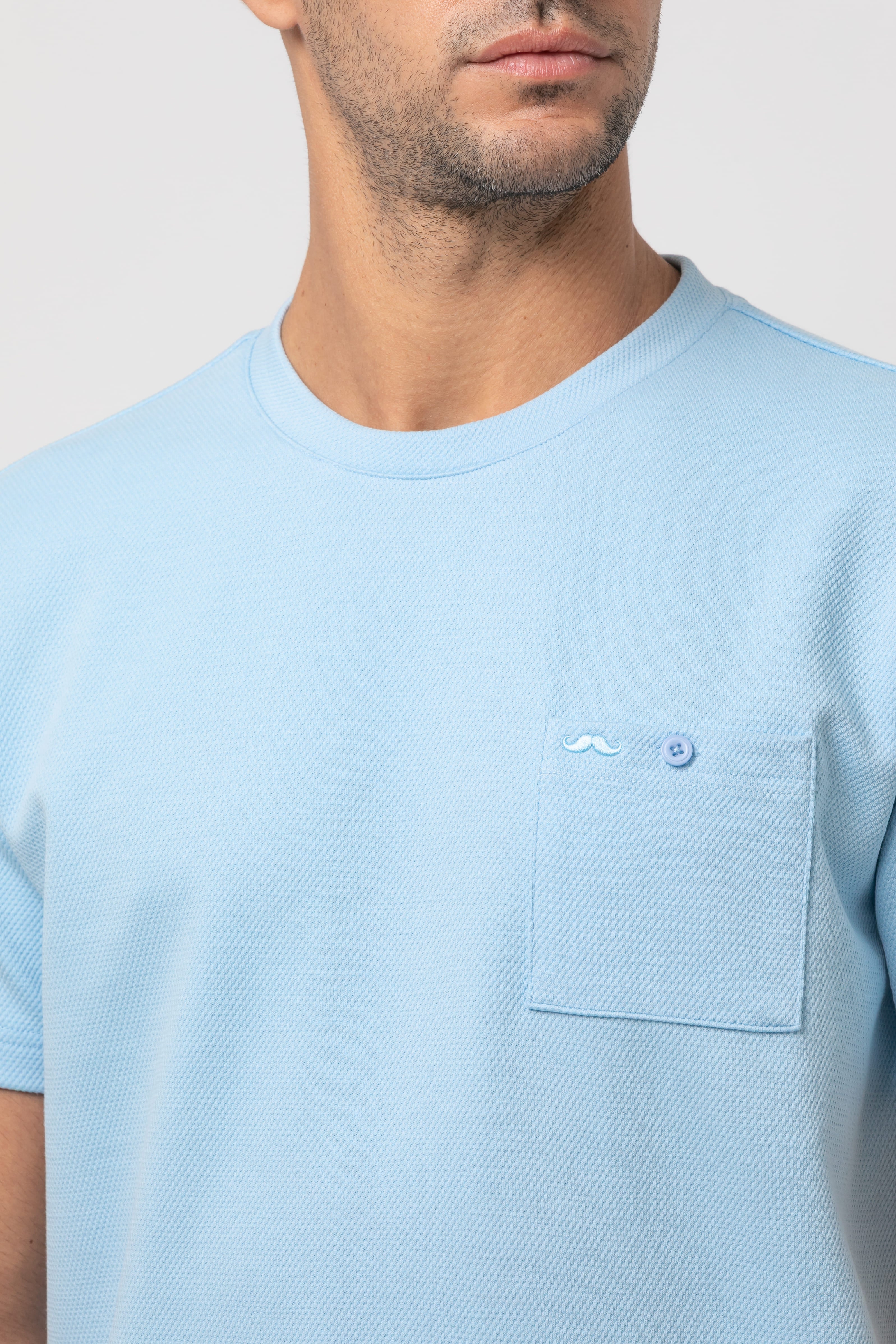 Camiseta bolsillo s/ sombrero