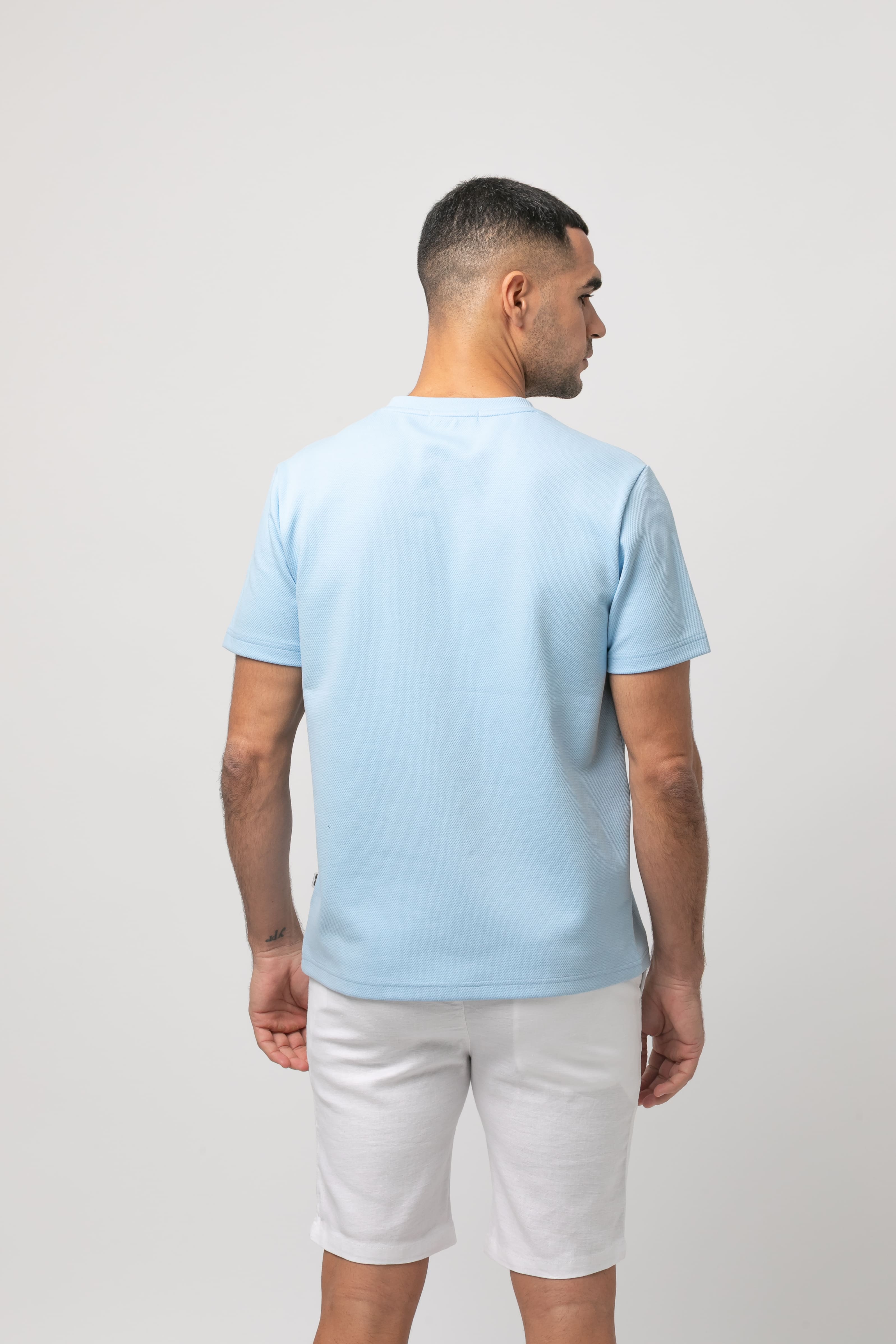 Camiseta bolsillo s/ sombrero