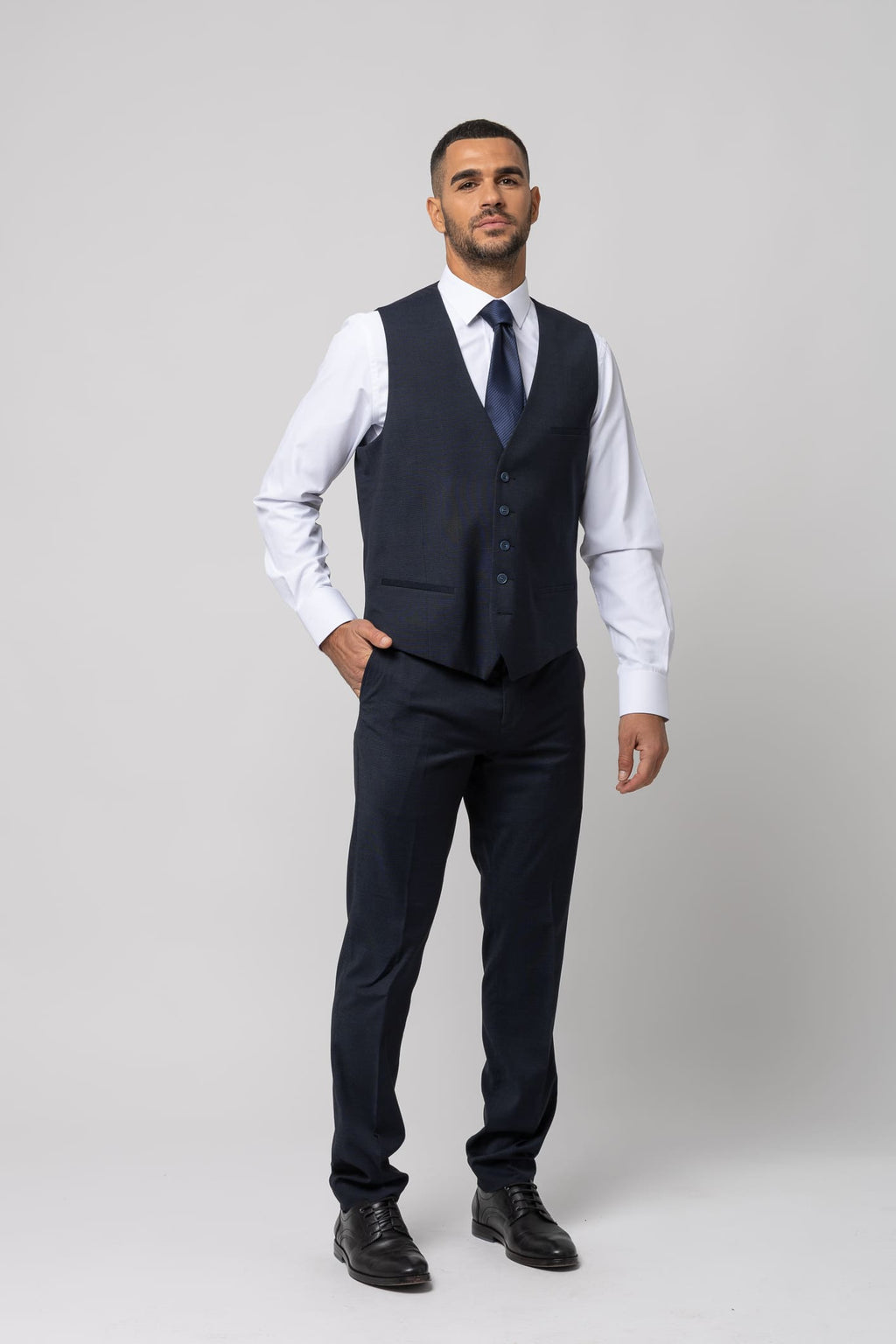 Chaleco de vestir traje s/ travertino