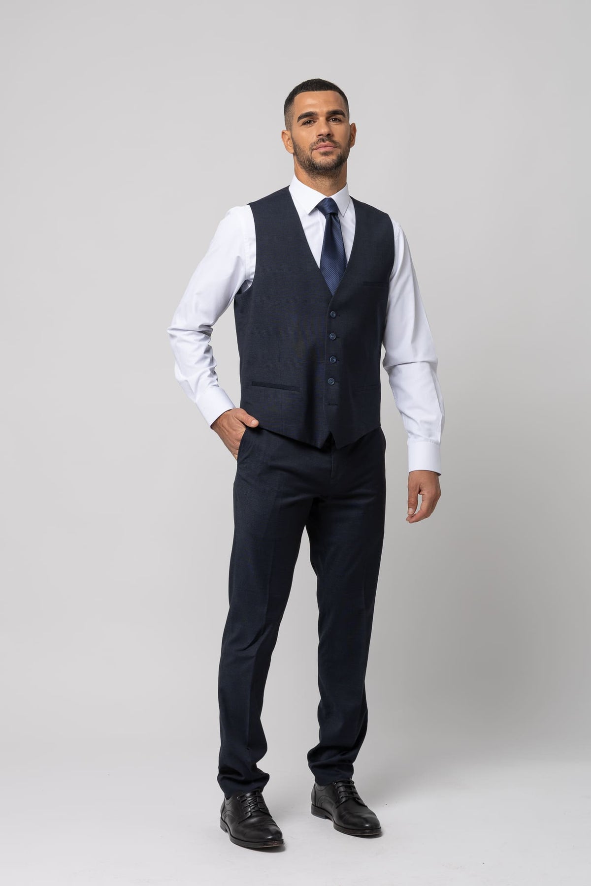 Chaleco de vestir traje s/ travertino